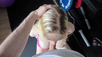 Fit blonde girl seduces her coach in public gym and gets fucked & cum on face
