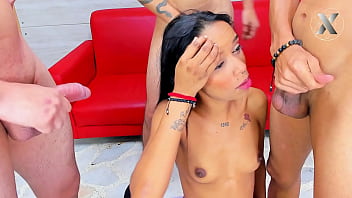 Submissive slut on her knees sucking 3 cocks