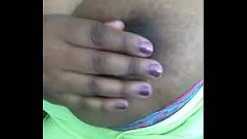 Busty ebony teen massages her tits