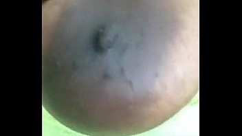 Busty ebony teen massages her tits