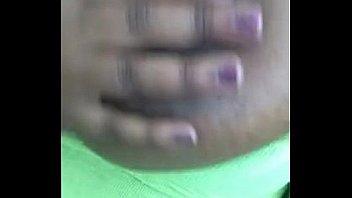 Busty ebony teen massages her tits