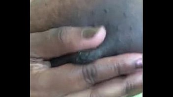 Busty ebony teen massages her tits