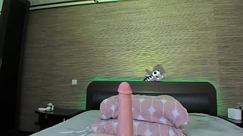 Teasing and sucking a dildo toy