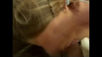 Sexy blonde girl with nice tits loves to suck cock on her knees