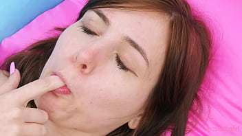 Enchanting brunette plays with her sexy body