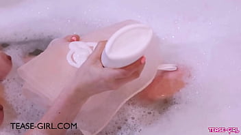 Pretty brunette caress her body in the bath