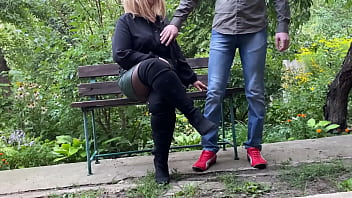 Mature milf in sexy clothes helps a man pee outdoors
