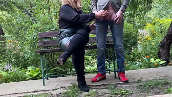 Mature milf in sexy clothes helps a man pee outdoors