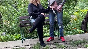 Mature milf in sexy clothes helps a man pee outdoors Mature milf in sexy clothes helps a man pee outdoors