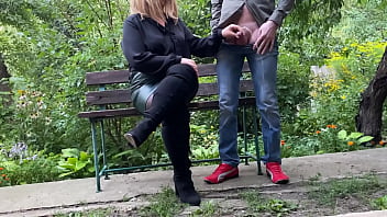 Mature milf in sexy clothes helps a man pee outdoors