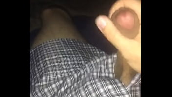 Masturbating