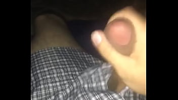 Masturbating