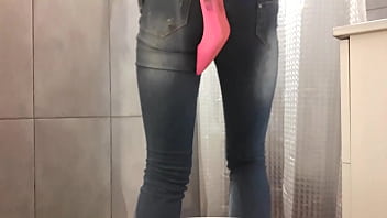 Desperate pee in my jeans and pink high heels