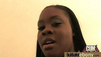 Ebony in a huge bukkake 30