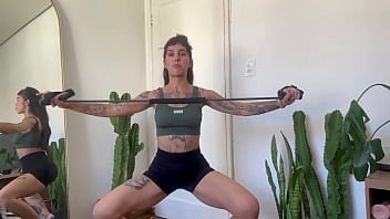 Inked girl rubber band workout warm up strength sfw yoga fitness