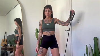 Inked girl rubber band workout warm up strength sfw yoga fitness
