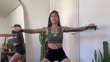 Inked girl rubber band workout warm up strength sfw yoga fitness