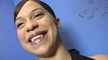 Ebony teen shows off her blowjob skills at gloryhole 14