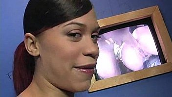 Ebony teen shows off her blowjob skills at gloryhole 14