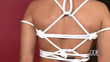 Sexy tanned babe gets bound naked