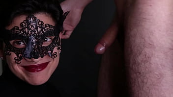 A mysterious masked woman gives me a blowjob and receives the reward on her face