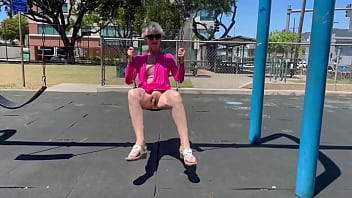 Playing on a swing in kaimuki btw this is not at a school and there was nobody nearby