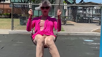 Playing on a swing in kaimuki btw this is not at a school and there was nobody nearby