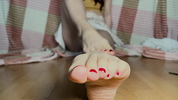 Beautiful legs with red nails