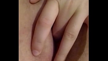 Busty brunette touching herself