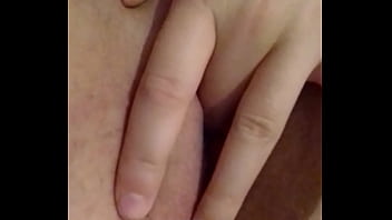 Busty brunette touching herself