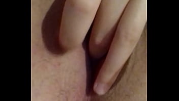 Busty brunette touching herself