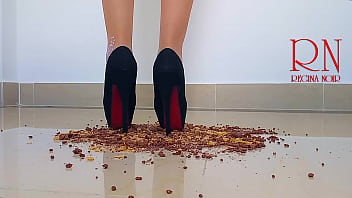 Cornflakes destroying with high heels boots on the floor