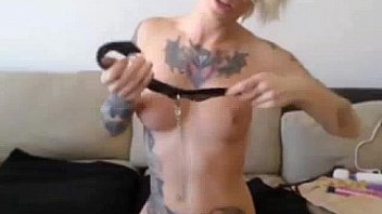 Naughty tattooed blonde in collar loves playing with toys