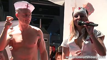 Hot brunette nurse is stripping