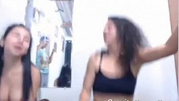 2 girls riding 2 cocks