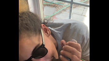 Lightskin ebony slut little step sister giving blowjob in front of window gets cum on her face while her boyfriend is looking for her