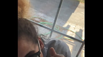 Lightskin ebony slut little step sister giving blowjob in front of window gets cum on her face while her boyfriend is looking for her