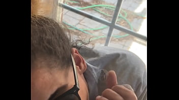 Lightskin ebony slut little step sister giving blowjob in front of window gets cum on her face while her boyfriend is looking for her