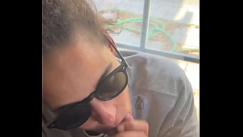 Lightskin ebony slut little step sister giving blowjob in front of window gets cum on her face while her boyfriend is looking for her