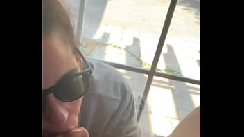 Lightskin ebony slut little step sister giving blowjob in front of window gets cum on her face while her boyfriend is looking for her