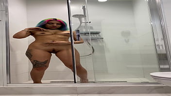 Naked roxy showers and masturbates