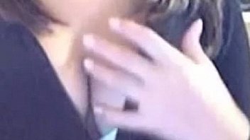 Cute brunette teasing the webcam in hoodie