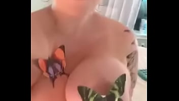 Girl plays with big titties