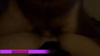 Young couple tumbling in bed