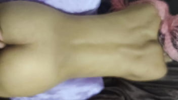 Laying on the bed while he fucks my pussy