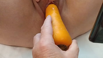 Naughty girl veggie fucking