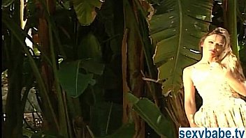 Nude brunette babe outside stripping off