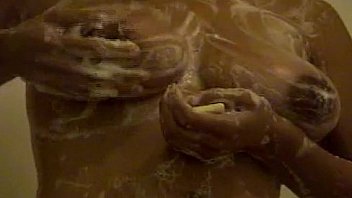 Shower time for busty milf