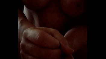 Busty wife performs 2 handed handjob