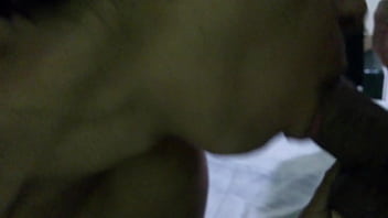 Jade sucking while using her toy